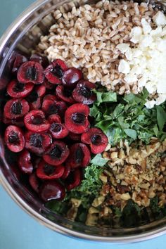 a bowl filled with different types of vegetables and grains on top of eachother