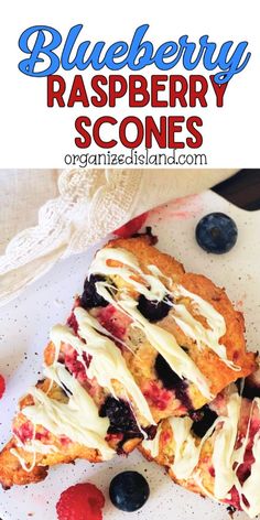 blueberry raspberry scones on a plate with berries