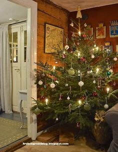 a decorated christmas tree in a living room