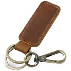 a leather keychain with two metal rings attached to it