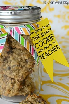 a cookie in a jar with a teacher's tag on it that says, i'm going to be one smart cookie with you as my teacher