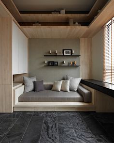 a living room filled with lots of furniture and decor