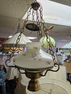 a chandelier hanging from the ceiling in a store