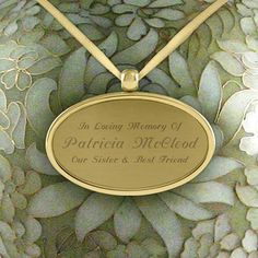 a close up of a gold plated necklace on a floral background with words in the center