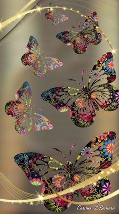 several butterflies are flying in the air with sparkles on their wings, and there is no image here to provide a caption for