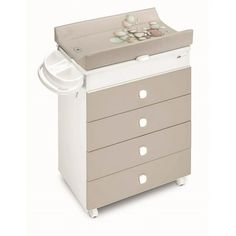 Multi-purpose bath and changing station with drawers, made in Italy. The baby bath has 2 anatomically-shaped seats, one seat with an incline for babies ages 0-6 months and the other seat with armrests for babies 6-12 months of age. Features : Material: Wood Finish: Multi-color (white, natural) Plug and water drainage pipe 4 drawers with metal runners 4 castor wheels with 2 brakes Wooden top for use as a furniture unit Soft changing mat with tip-up prevention system Soap and sponge compartments S Diaper Changing Station, Baby Dresser, Castor Wheels, Drainage Pipe, Changing Station, Changing Mat, Baby Nursery Decor, Wooden Tops, Baby Bath