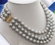 the price is only cost price .we sell it so cheap ,only hope to attract more buyer to my store ,if you like it ,please don't miss it ,I sure you will like them ,thanks . it is very nice    please assured order  pearls size : 9-10 mm Metal  : 14K pearls shape : picture necklace length : 16-18  inch. (Change the length contacts us please) Luster : Excellent  Luster AAA. Package :  Magnificent silk small bag . Because of the variance in sizes of natural gemstones, lengths could vary ~0.5in Actual color may appear a little differnt due to the resolution of each computer screen, please see carefully before you please your bidding. Some question please look the following; Q:   Are these real genuine pearls? A:    Yes, all the pearls we're selling are 100% real genuine pearls. Q:   You say these Gray Pearl Necklace, Grey Pearl Necklace, Southern Ocean, Picture Necklace, Saltwater Pearls, Pearl Types, Pearl Pendant Necklace, Chain Necklaces, Freshwater Pearl Necklaces