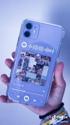 a person holding up a cell phone case with pictures on the front and back cover