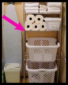 a shelf with two baskets and three rolls of toilet paper