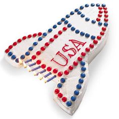 a toothbrush with red, white and blue beads on it's side that says usa