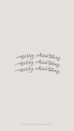 the words merry christmas are written in cursive writing