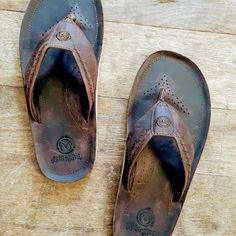 We Just Bought All The Inventory From Ocean Minded Inc..They Are Shutting Down And Leaving California For Good..We Have 9,000 Pairs...Bulk Discounts Available..Please Contact Us On Pricing For 50 Or More Pairs...Msrp $85 Leather Round Toe Flip Flops For Beach, Brown Flip Flops With Ortholite Insole, Casual Brown Flip Flops With Ortholite Insole, Rugged Sandals With Textured Footbed And Round Toe, Rugged Brown Slip-on Sandals, Brown Casual Slip-on Flip Flops, Brown Synthetic Toe Post Flip Flops, Brown Casual Open Heel Sandals, Casual Brown Open Heel Sandals