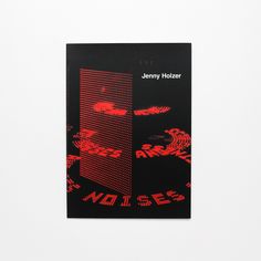 a black and red book with an image of a tall building on it's cover