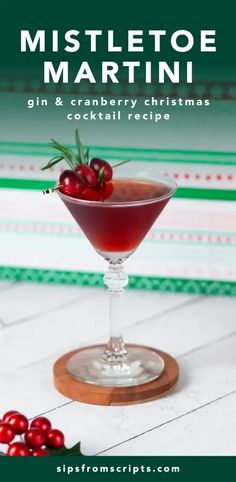 a cocktail in a glass with cherries on the rim and text overlay reads mistletoe martini gin & cranberry christmas cocktail recipe