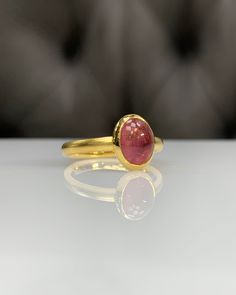 Natural Pink Tourmaline Ring * Dainty Cabachon Ring * Genuine Tourmaline & 14K Solid Gold * Best Gift for Her/Him * Handmade Ring ◎ Details ◎ ○ Gemstone Details .Natural PINK TOURMALINE Oval Cut 9X7 mm approx. 2.09 ct ○ Gold Details 14K Solid Gold Width of Band : 2.50 mm Weight of Ring : approx 3.80 gr Made to Order HANDMADE ITEM ○ Upgrade to Solid 18K Gold, please click the link below: https://www.etsy.com/listing/962826004 For more CABACHON BEZEL rings : http://etsy.me/37fvI60 All of our j Heirloom Gold Tourmaline Ring, Classic Gold Tourmaline Jewelry, Gold Oval Tourmaline Ring, Gold Tourmaline Gemstone Rings, Gold Tourmaline Rings, Yellow Gold Tourmaline Cabochon Ring, Yellow Gold Tourmaline Birthstone Ring Gift, Classic Gold Tourmaline Rings, Handmade Tourmaline Gold Ring