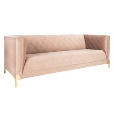 a pink couch with gold legs on a white background