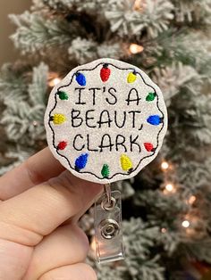 "Express yourself in style while dressing up your ID with this delightful handcrafted glitter Badge Reel!  This little retractable lanyard would make a perfect gift for nursing and hospital staff, doctors, students, teachers, child care providers, office workers, and anyone who adorns keys, identification, or swipe cards. Or treat yourself! The Christmas design is created from soft yet sturdy vinyl and glitter canvas. The felt ornament is affixed to a round retractable reel which is extendable t Christmas Badge Reel, Christmas Badge, Swipe Card, Teacher Badge, Nurse Badge Holders, Hospital Staff, Felt Ornament