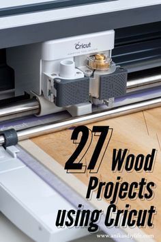 the words 27 wood projects using cricut are shown in front of a machine