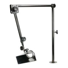 an adjustable desk lamp with a metal base