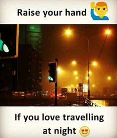 an image of a street at night with the words raise your hand if you love travelling at night