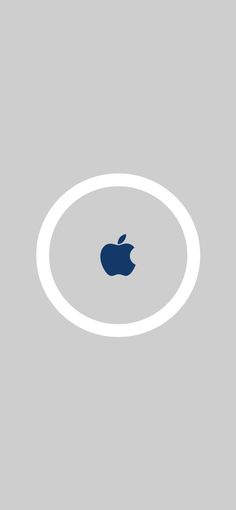 an apple logo is shown in the middle of a gray and white circle on a grey background