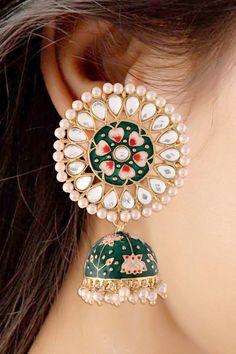 I Jewels 18k Gold Plated Traditional Handcrafted Kundan Pearl Studded Meenakari Jhumki Earring for Women (E2917G) Stylish meenakari worked traditional 18k gold plated round stud earrings with lovely combination of colors from I Jewels. These earrings, made with Love by our karigar with real carftmanship, will complement any occasion ethnic wear. These beautiful earrings are handcrafted in alloy with pearls of good quality. Coated with high quality and thickness gold. Product Features: Color: Gre Traditional Round Pallu Jewelry For Navratri, Multicolor Bollywood Round Earrings, Green Intricate Design Gold-plated Earrings, Bollywood Multicolor Round Earrings, Bollywood Style Multicolor Round Earrings, Green Gold-plated Earrings With Intricate Design, Gold Plated Cutdana Jhumkas As Gift, Navratri Meenakari Jewelry, Green Chandbalis With Cutdana