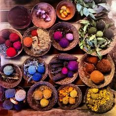 several baskets filled with different types of colorful items