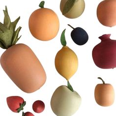 an assortment of fruits and vegetables on a white background