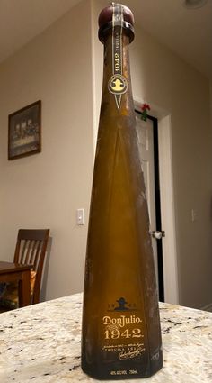 a bottle of champagne sitting on top of a table