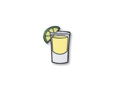 a pin with a lemon slice and a drink in it