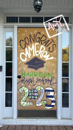 a door with some writing on it that says congrats gamers and harrison high school