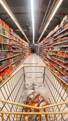 an empty shopping cart in a grocery store