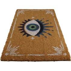 a door mat with an eye on it