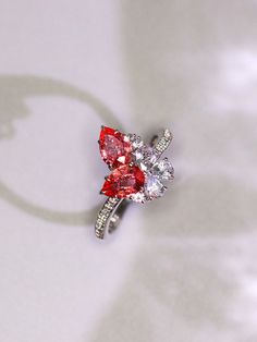 *Condition: Brand new *Center Stone: Natural Padparadscha Sapphire, Teardrop Cut, approx 0.55/0.66ct *Side stones: Natural white diamond round-cut (VS1 clarity and F color) Natural white sapphire *Metal Purity: Can be select Each piece is made-to-order with care and special attention to detail. all items are made with conflict-free diamonds and gems. Size: made to order The item will be gift wrapped and shipped. ------------------------------------------------------------------- Available in : 1 Luxury Red Pear-shaped Ring, Teardrop Ruby Ring With Diamond In Fine Jewelry Style, Teardrop Ruby Ring In Fine Jewelry Style, Fine Jewelry Teardrop Ruby Ring With Diamond, Luxury Pear-shaped Ruby Wedding Ring, Red Diamond Teardrop Rings, Gift Ruby Ring With Diamond In Pear Shape, Gift Pear-shaped Ruby Ring With Diamond, Red Teardrop Diamond Rings