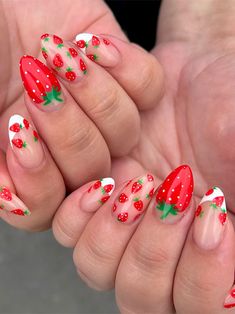 Long nude almond-shaped nails adorned with tiny strawberries with two accent white classic French tips Acrylics Design Ideas, French Inspired Nails, Almond Manicure Ideas, Strawberry Nails Simple, Fruit Nails Simple, Almond Strawberry Nails, Hot Dog Nails, Cute Acrylic Nails For Summer Almond, Strawberry Nail Ideas