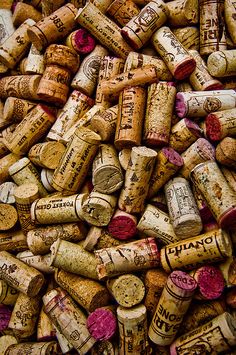 a pile of wine corks sitting next to each other