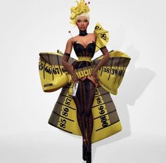 a woman in a dress made out of yellow tape and plastic wrappers with her hands on her hips