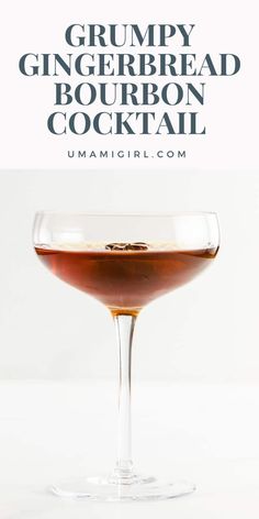 a glass filled with liquid and the words grumpy gingerbread bourbon cocktail