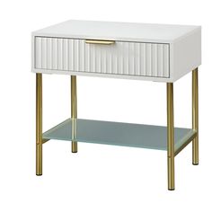 a white and gold side table with drawers