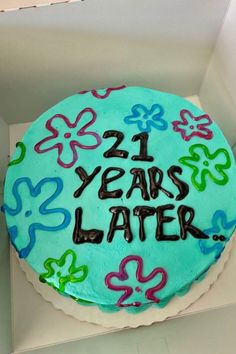 a birthday cake in a box with the number twenty years later written on it's frosting