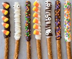 six halloween pretzels are lined up in a row