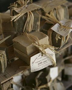 several soaps are stacked on top of each other with price tags attached to them