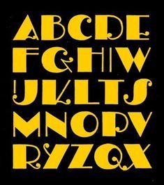 the alphabet is yellow and black with white letters on it's sides, as well as