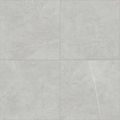 a white tile floor with four squares in the middle and one square at the bottom