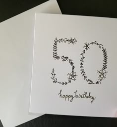 a white card with the number 50 printed on it