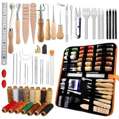 an assortment of crafting tools displayed on a white background