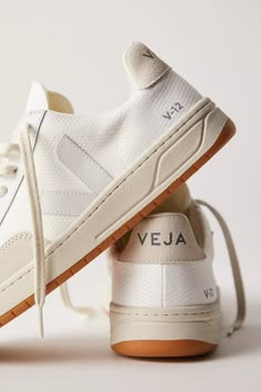 Veja V-12 Sneakers | Free People Trendy Shoes For Women Boots, Veja V-10 Sneakers, Casual Work Tennis Shoes, Italy Shoes Women, Veja Street Style, Women Fall Shoes, Best Sneakers 2024 Women, Trending Tennis Shoes 2024, Neutral Tennis Shoes Women