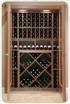 a wooden wine rack filled with lots of bottles