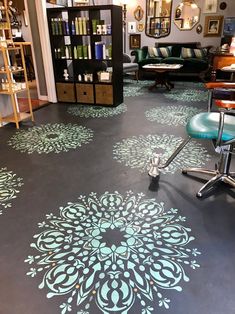 a salon with an intricate stencil design on the floor