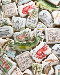 many decorated cookies with different designs on them